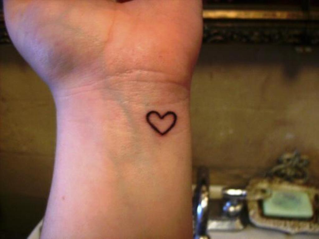 4. Elastic Heart Tattoo on Wrist - wide 3