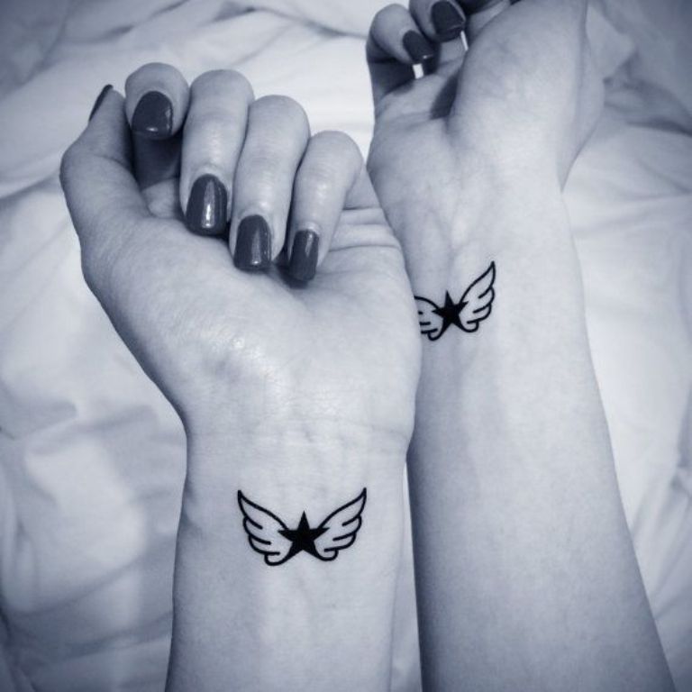 28 Elegant Angel Wings Tattoos On Wrists