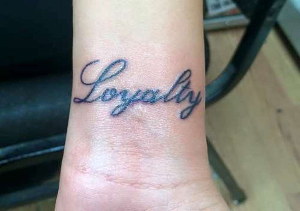 2. Meaningful loyalty tattoos in cursive - wide 1