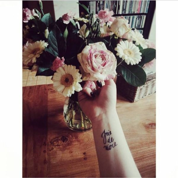 Adorable Joy Wrist Tattoo