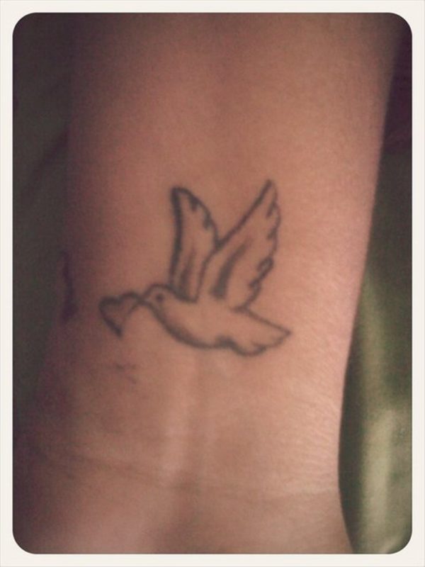 Amazing Grey Ink Dove Tattoo On Wrist