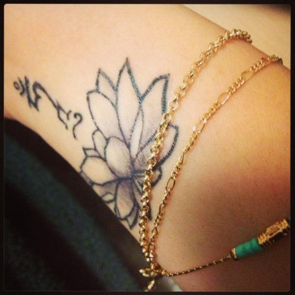 Amazing Lotus Flower Tattoo