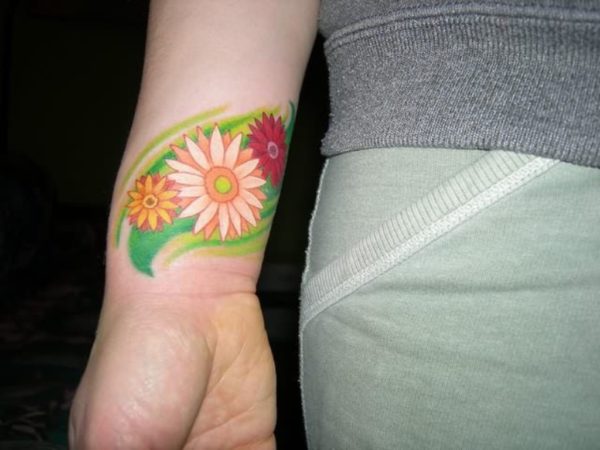 Attractive Daisy Flower Tattoo