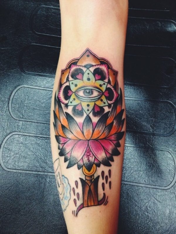 Attractive Flower And Eye Tattoo