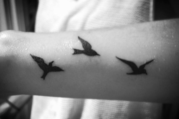 Attractive Flying Birds Tattoo