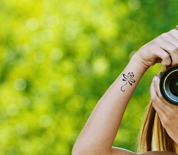 Attractive Lotus Tattoo On Wrist