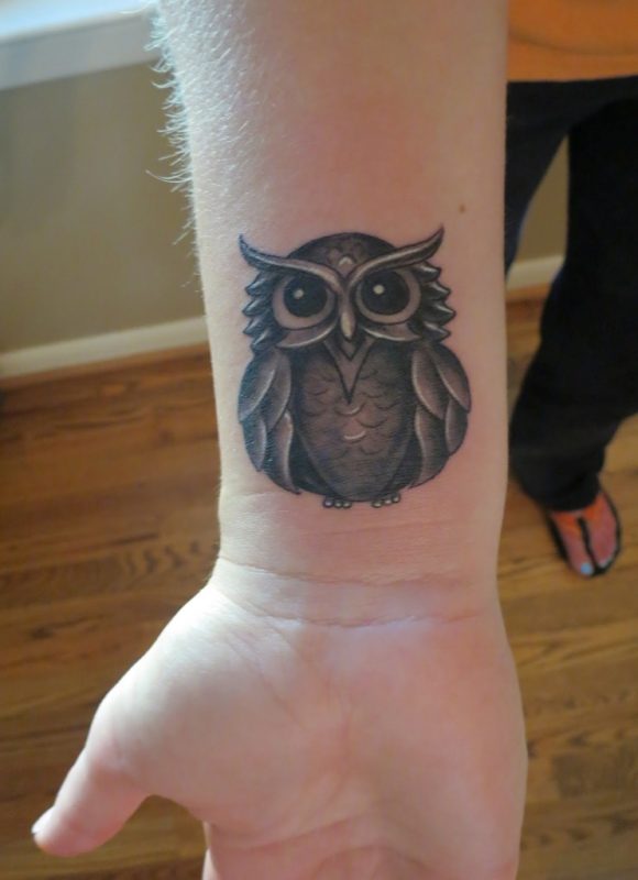 Attractive Owl Tattoo On Wrist