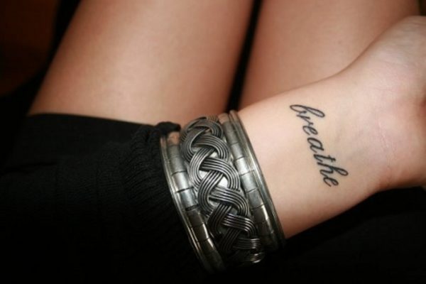 Attractive Word Tattoo On Wrist