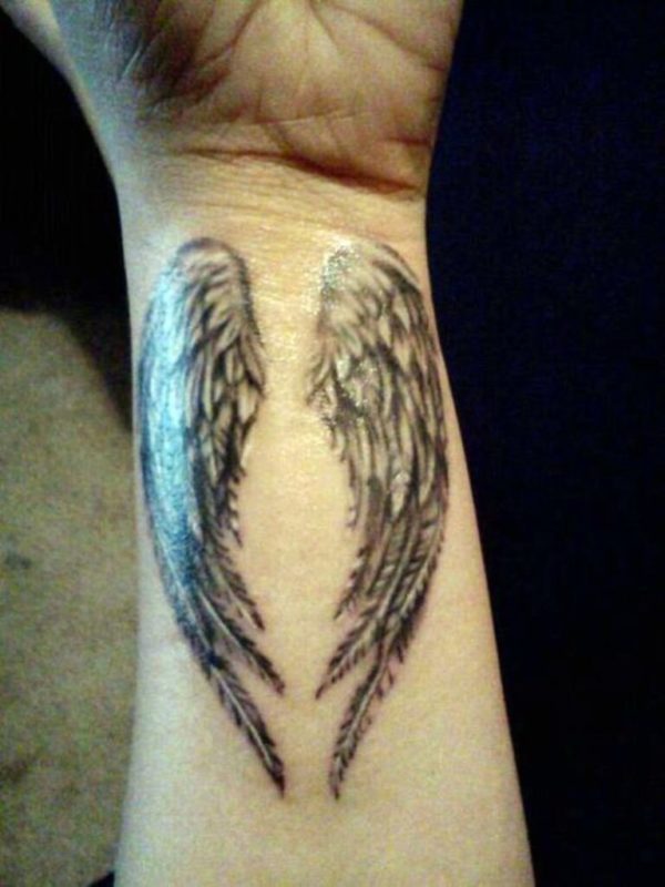 Awesome Angel Wings Tattoo Design On Wrist
