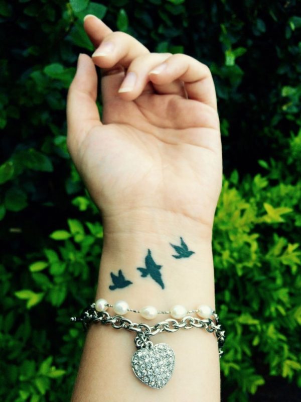 Awesome Black Birds Tattoo