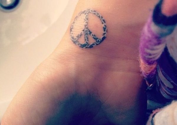 Awesome Peace Tattoo On Wrist