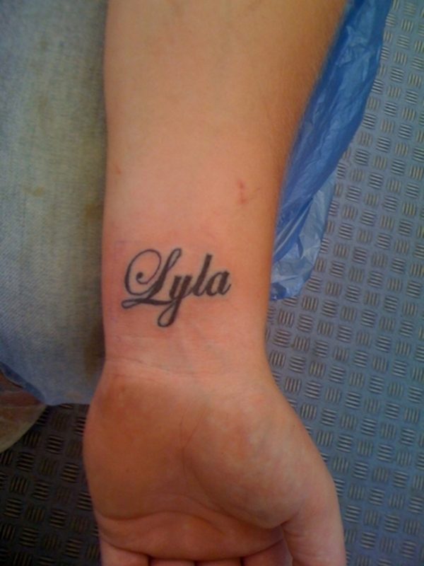 Awesome Word Tattoo On Wrist