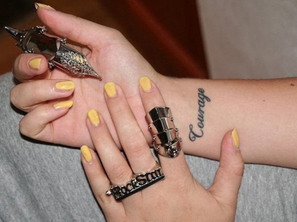 Awesome Wording Tattoo On Wrist 