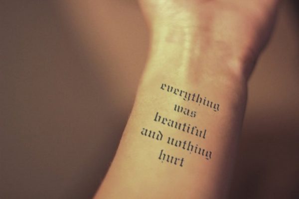 Awesome Wording Tattoo On Wrist