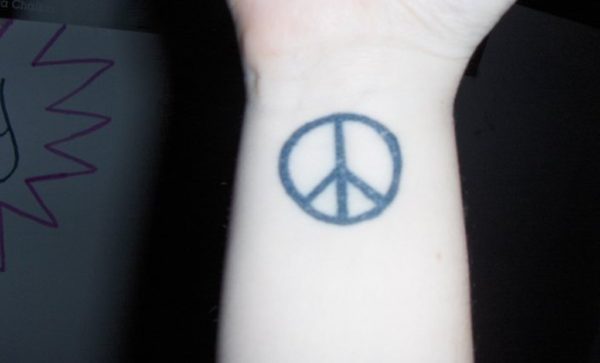 Beautiful Peace Sign Tattoo