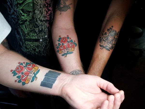 Beautiful Red Flower Tattoo On Wrist