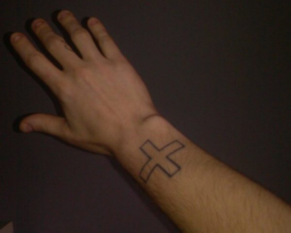 Big Outline Cross Tattoo On Wrist