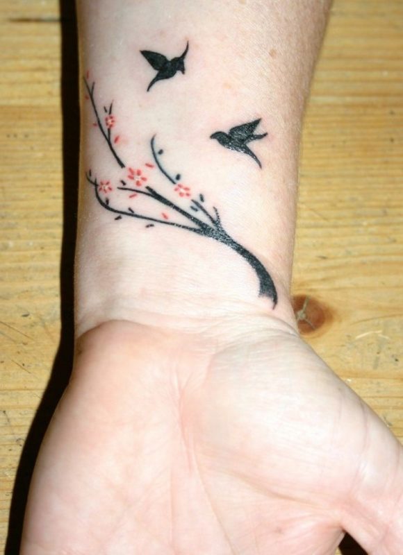 Bird And Flower Tattoos On Wrist