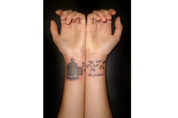 Birdcage Open Tattoo On Wrist