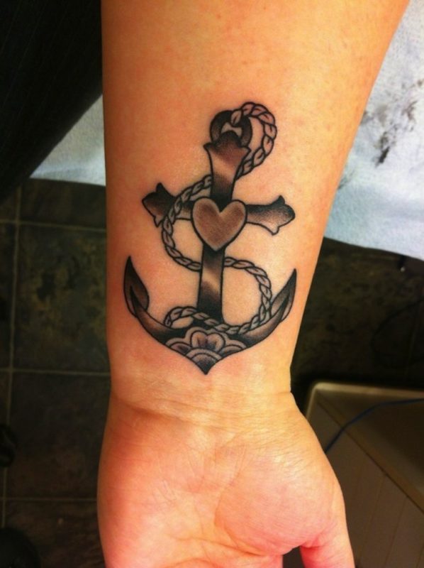 Black And Grey S Shaped Tattoo