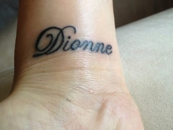 Black Dionne Name Tattoo On Wrist