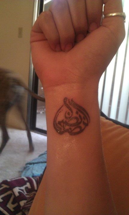 Black Ink Arabic words Tattoo