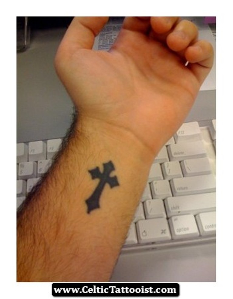 cross tattoo side wrist