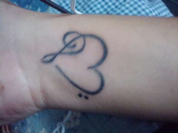 Black Ink Music Heart Tattoo