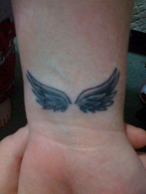 Black Ink Wings Tattoo