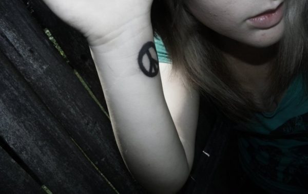 Black Inked Peace Tattoo