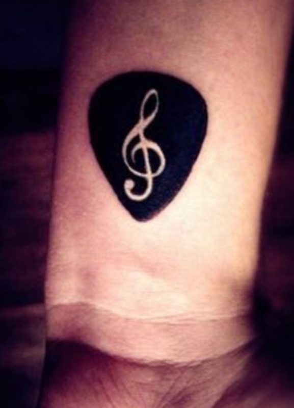 Black Music Note Tattoo On Wrist