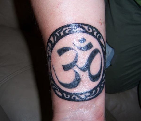 Black Om Tattoo On Wrist 