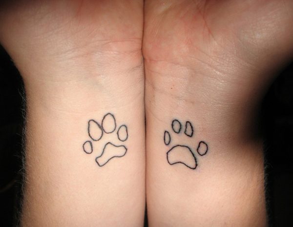 Black Outline Paw Tattoo On Wrist