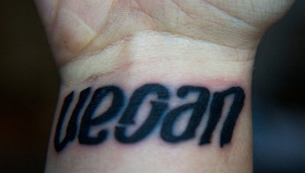 Black Vegan Wrist Tattoo
