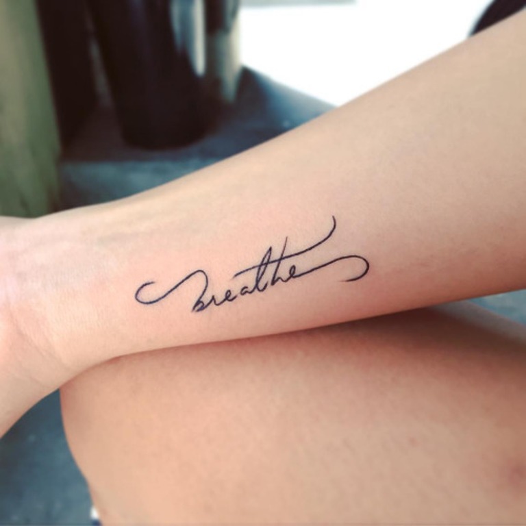 Breathe Letter Tattoo On Wrist.