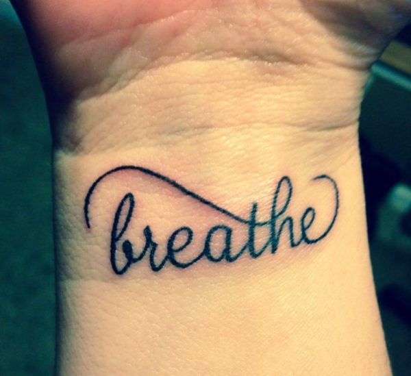 Breathe Lettering Tattoo On Wrist
