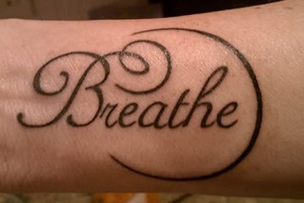 Breathe Word Tattoo On Wrist