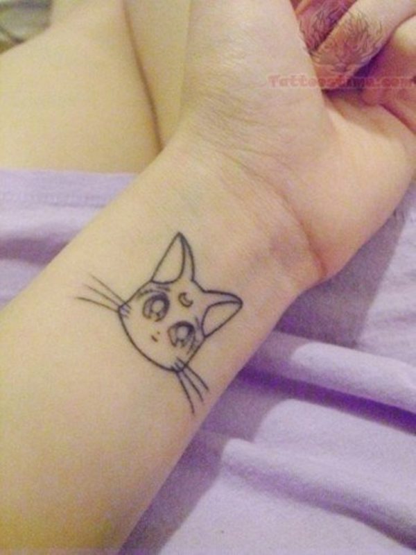 Cat Face Tattoo On Wrist