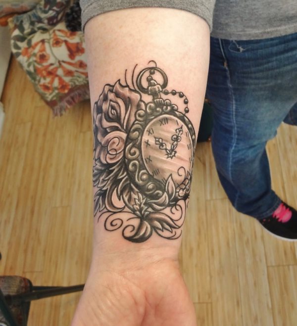 Clock And Flower Tattoo On Wrist