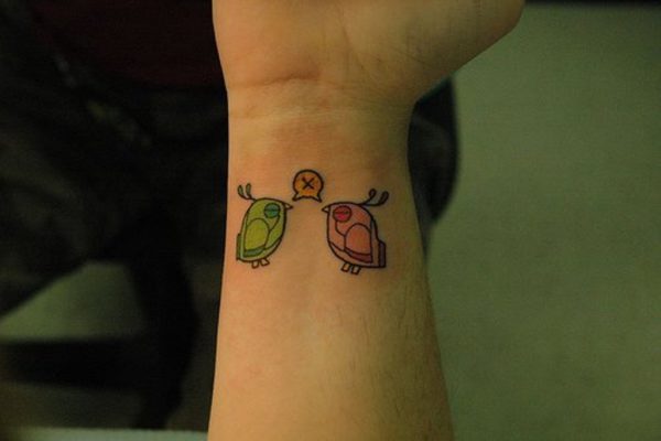 Colored Bird Tattoo On Wrist