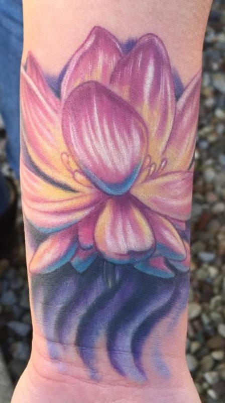 Colored Lotus Tattoo On Wrist