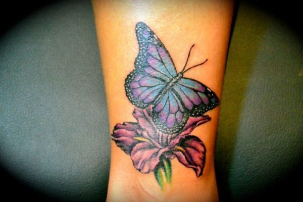 Colorful Butterfly And Flowers Tattoos On Wrist