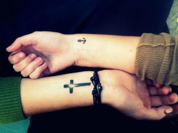 Cross And Bracelet Tattoo