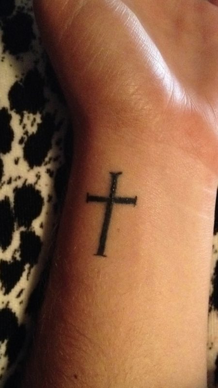 Cross Tattoo On Woman Wrist