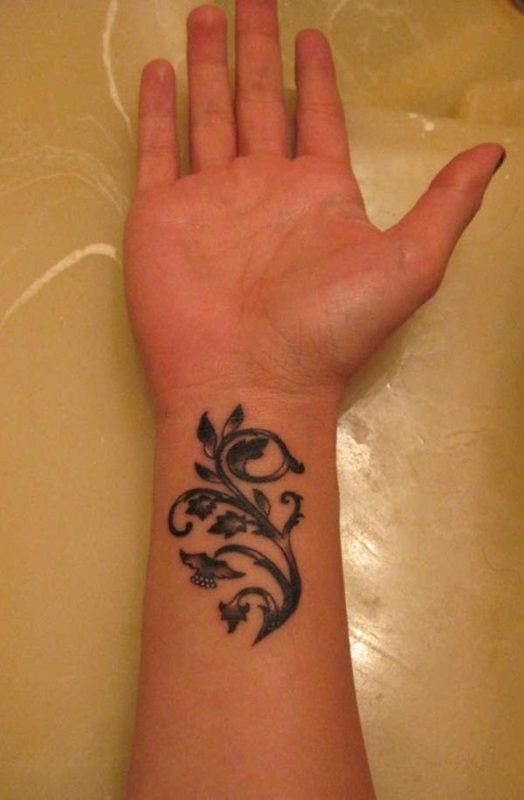 Cute Vine With Flower Tattoo On Wrist