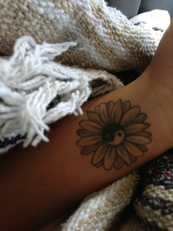 Daisy Flower Tattoo On Wrist