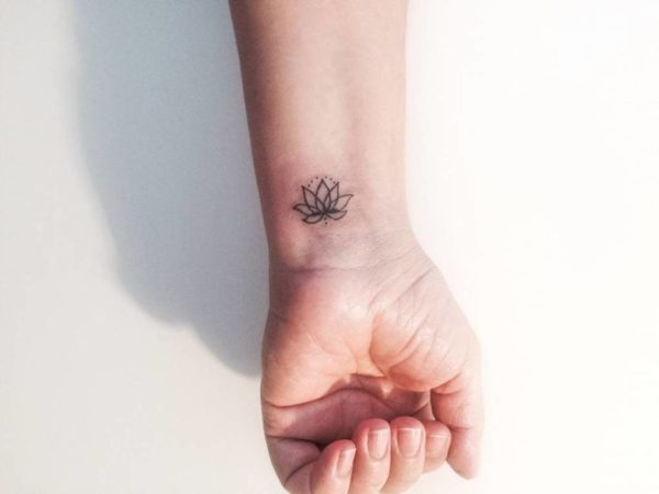 Elegant Lotus Tattoo On Wrist 