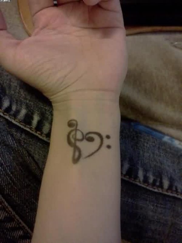 Elegant Musical Heart Tattoo