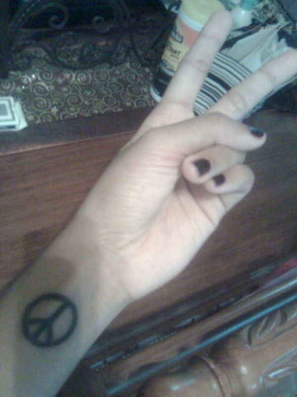 Elegant Peace Tattoo On Wrist