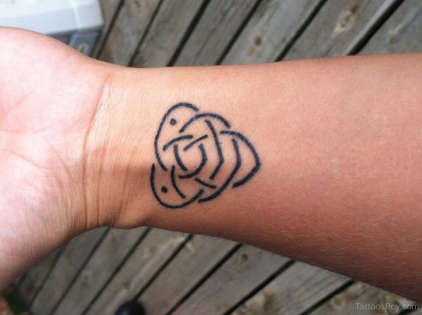 Elegant Wrist Tattoo